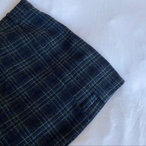 Plaid mini skirt with leg detail